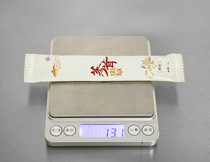 Weighing and filling precision test for packaging machines