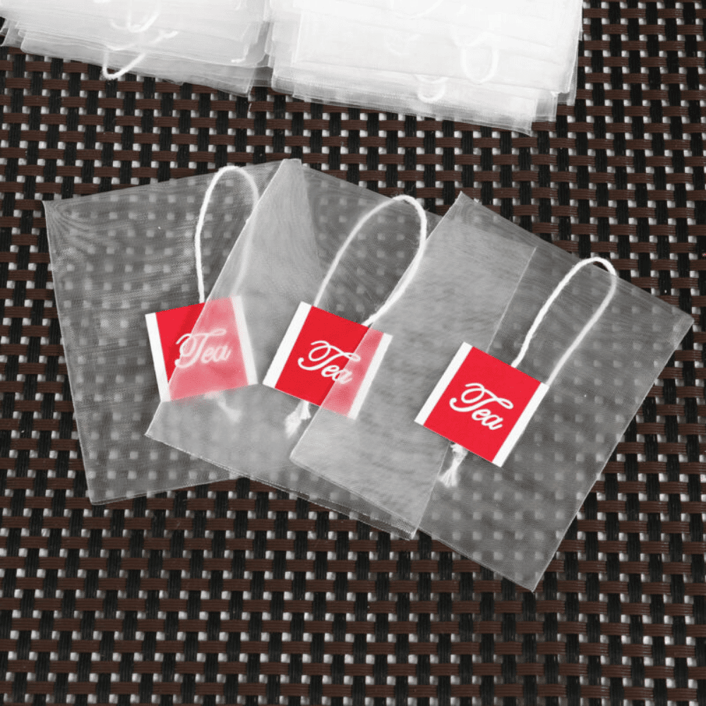 Flat filter tea bag with envelope